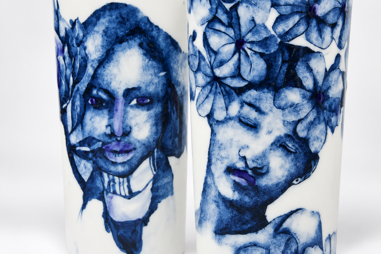 Blue porcelain vases featuring portraits of African women